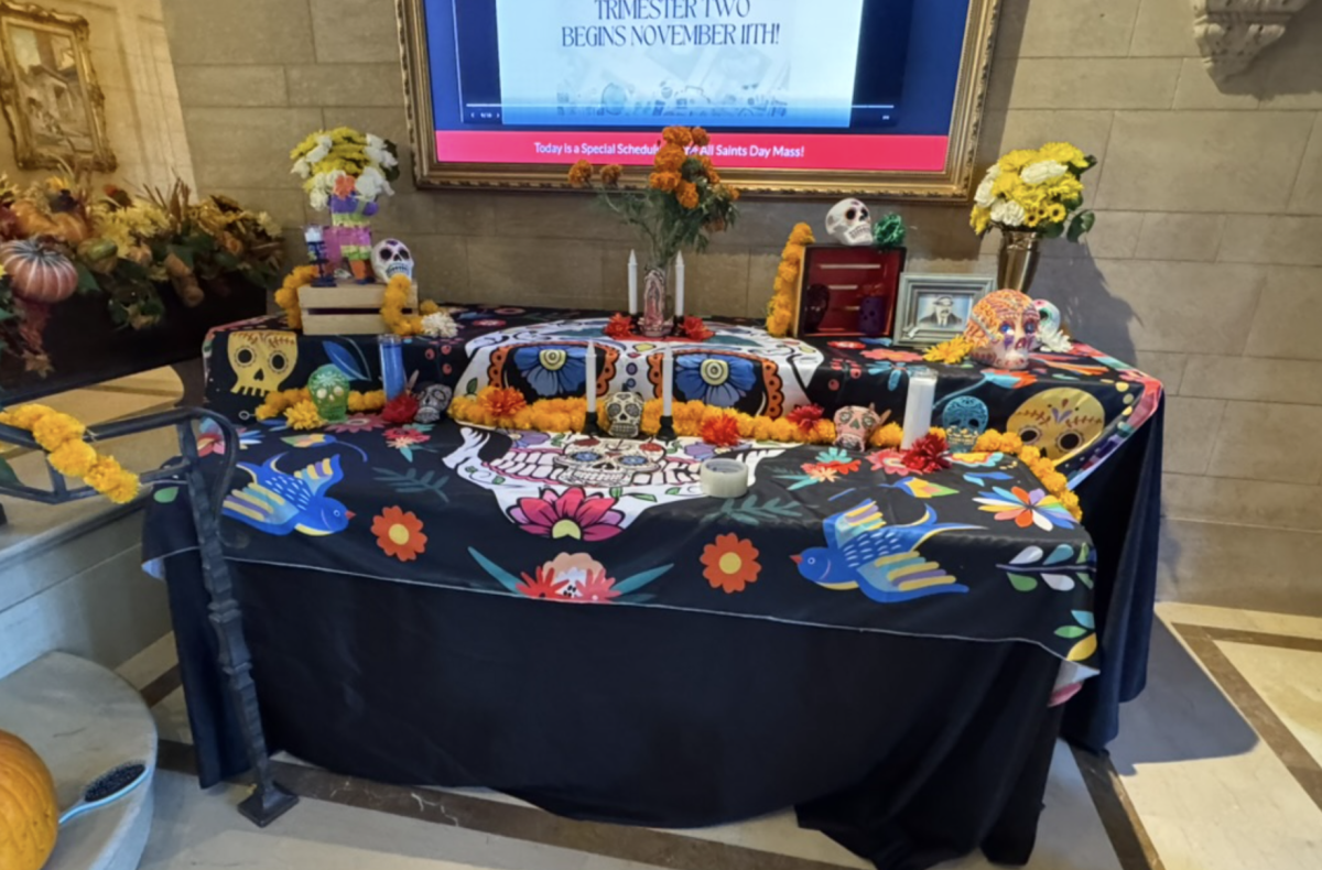 Mayfield students set up their Dia De Los Muertos Ofrenda!